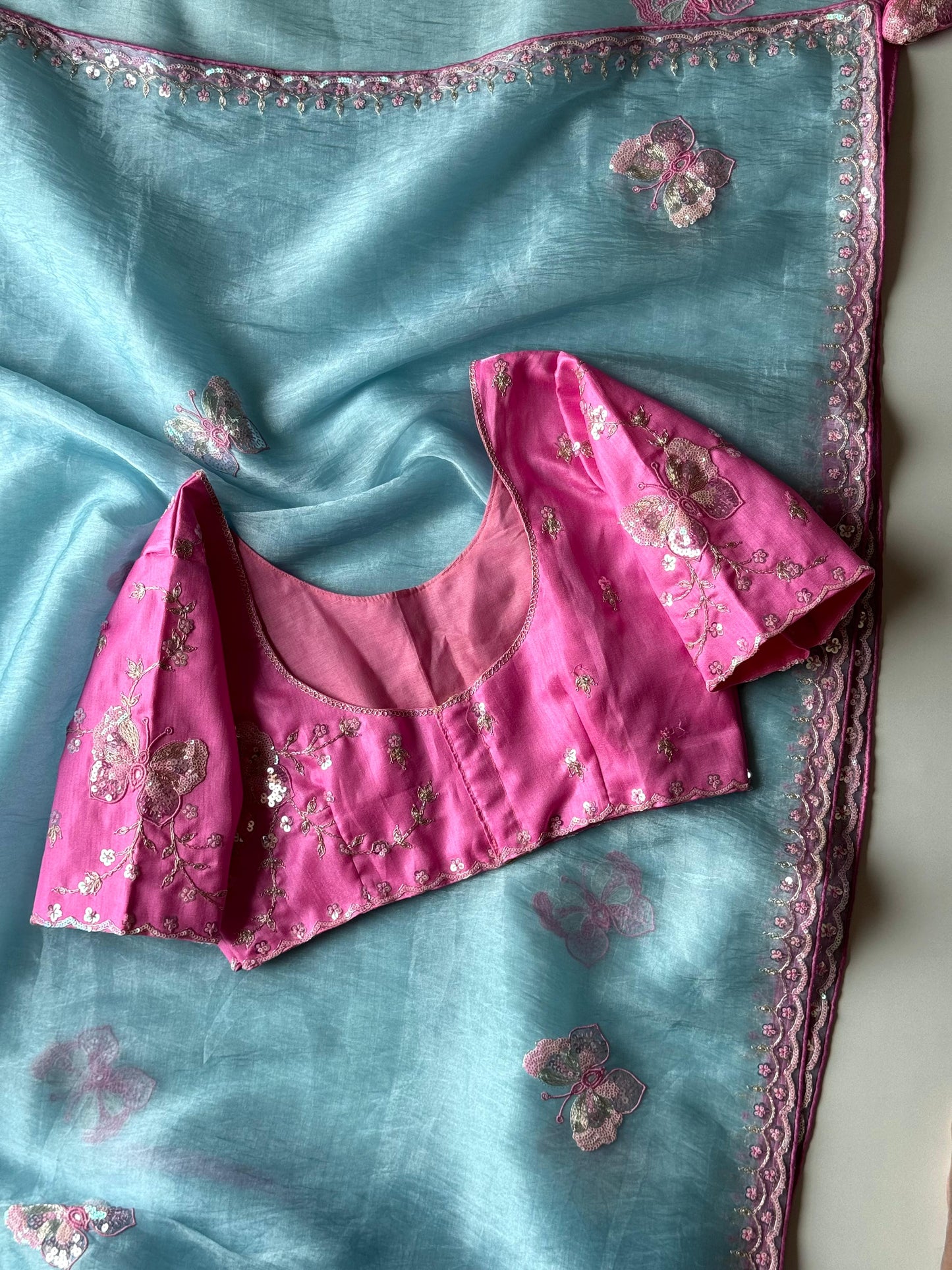 Luxe organza coding saree with stitched blouse