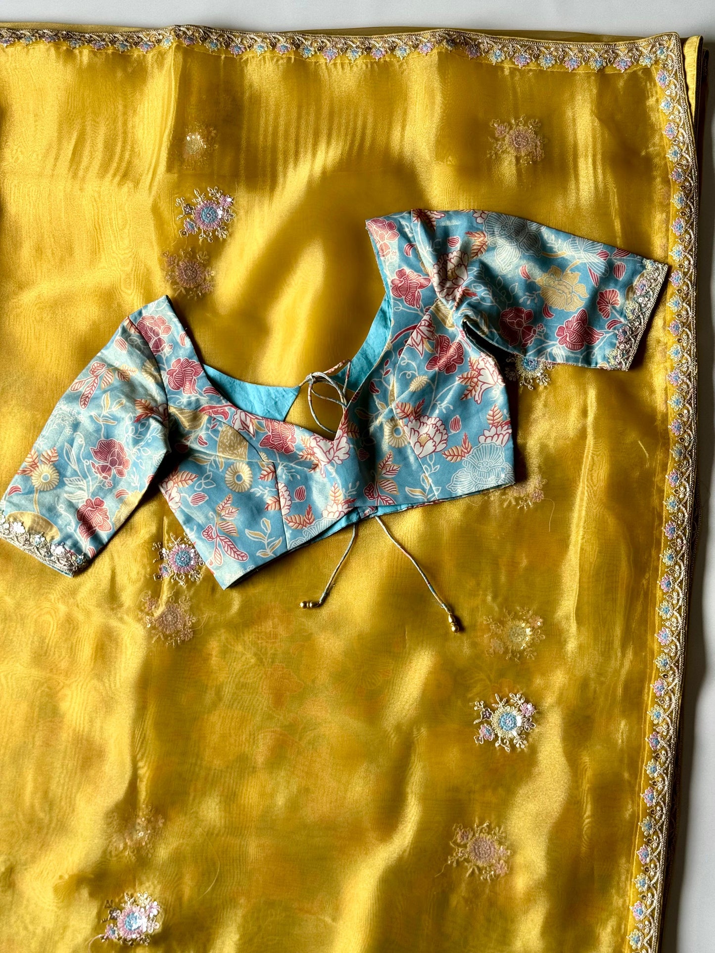 HaldiSpecial Premium tissue silk saree with coding work & multi colour sequence with Stitched Blouse