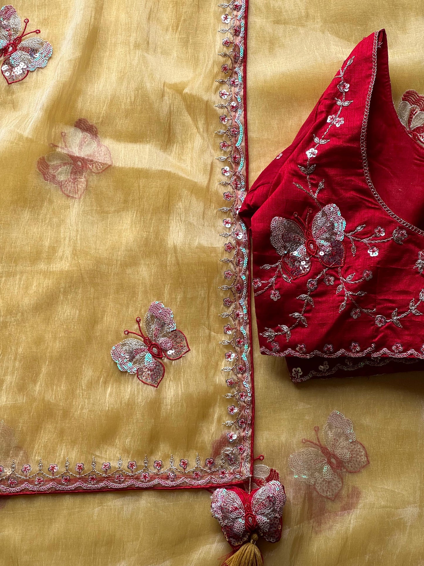 Luxe organza coding saree with stitched blouse