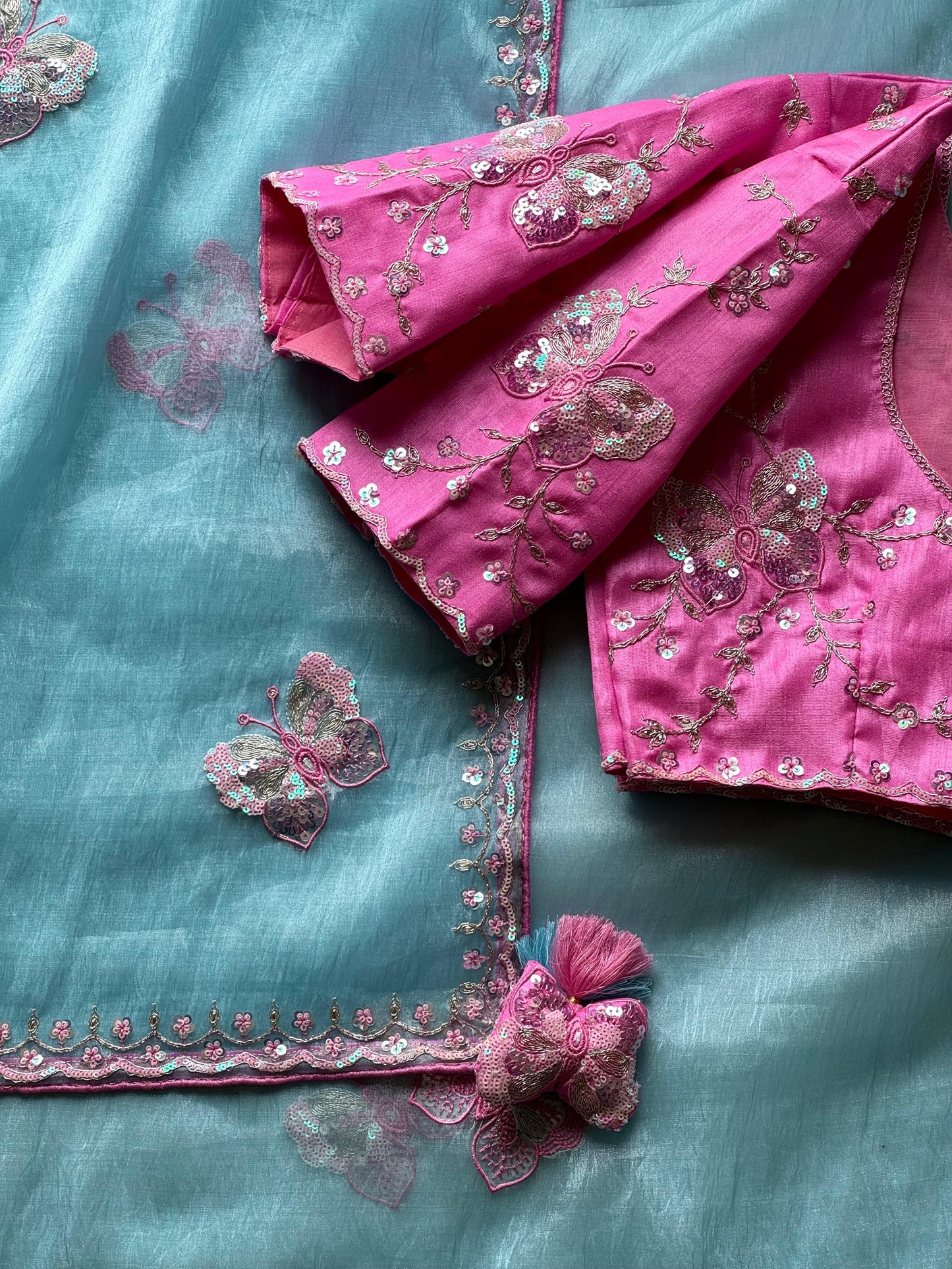 Luxe organza coding saree with stitched blouse