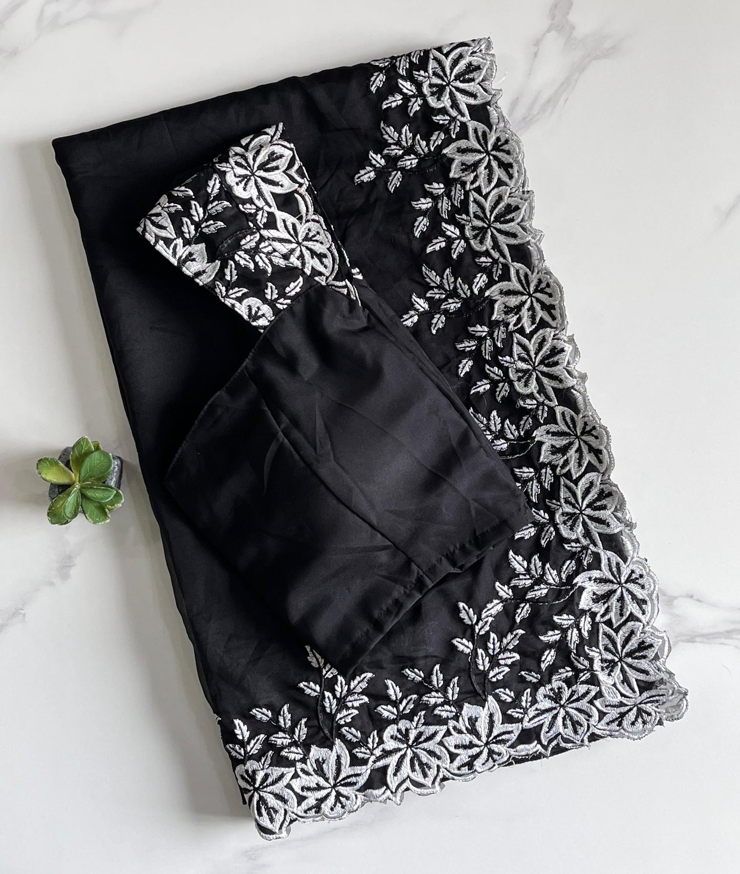 Tabi silk saree with white thread work on saree with stiched blouse