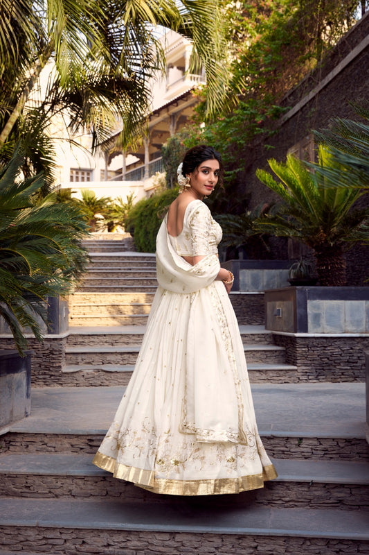 Off-white glam with intricate glossy dance Unstitched Lehengas