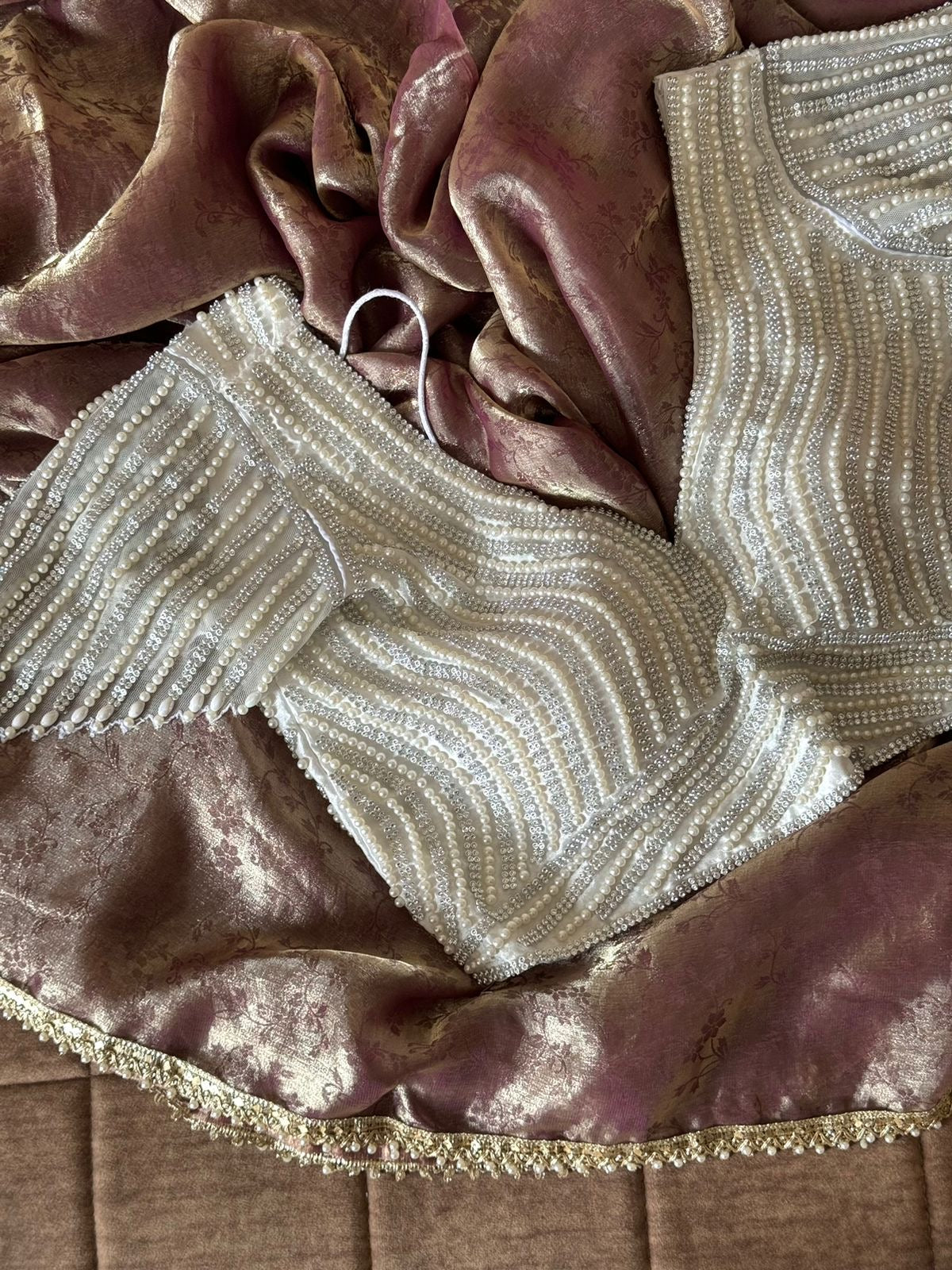Premium space silk saree with lace and pearl work stitched blouse