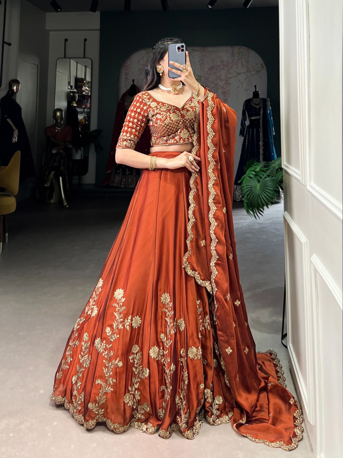 Rust Rangoli grand designer Lehenga