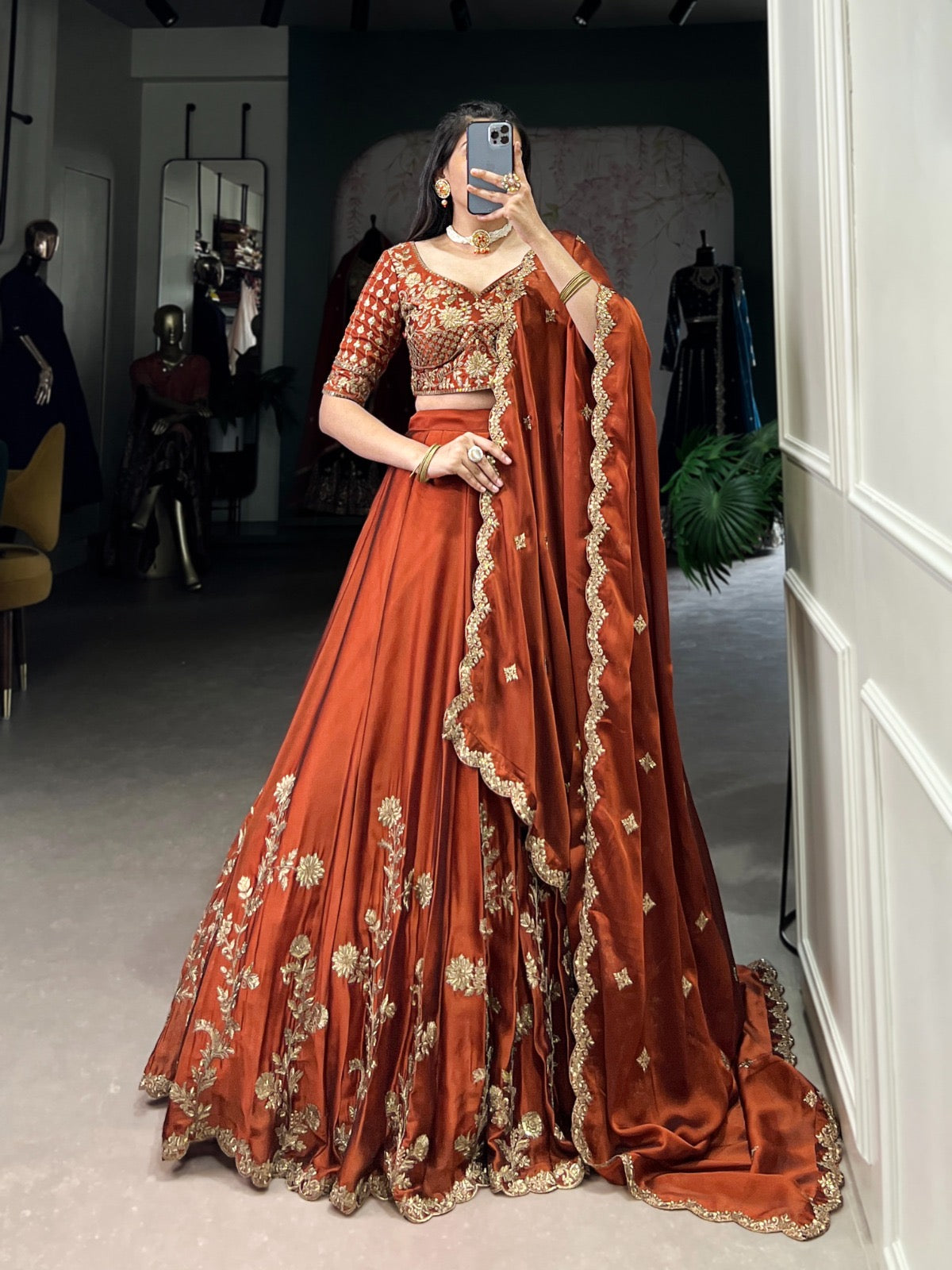 Rust Rangoli grand designer Lehenga