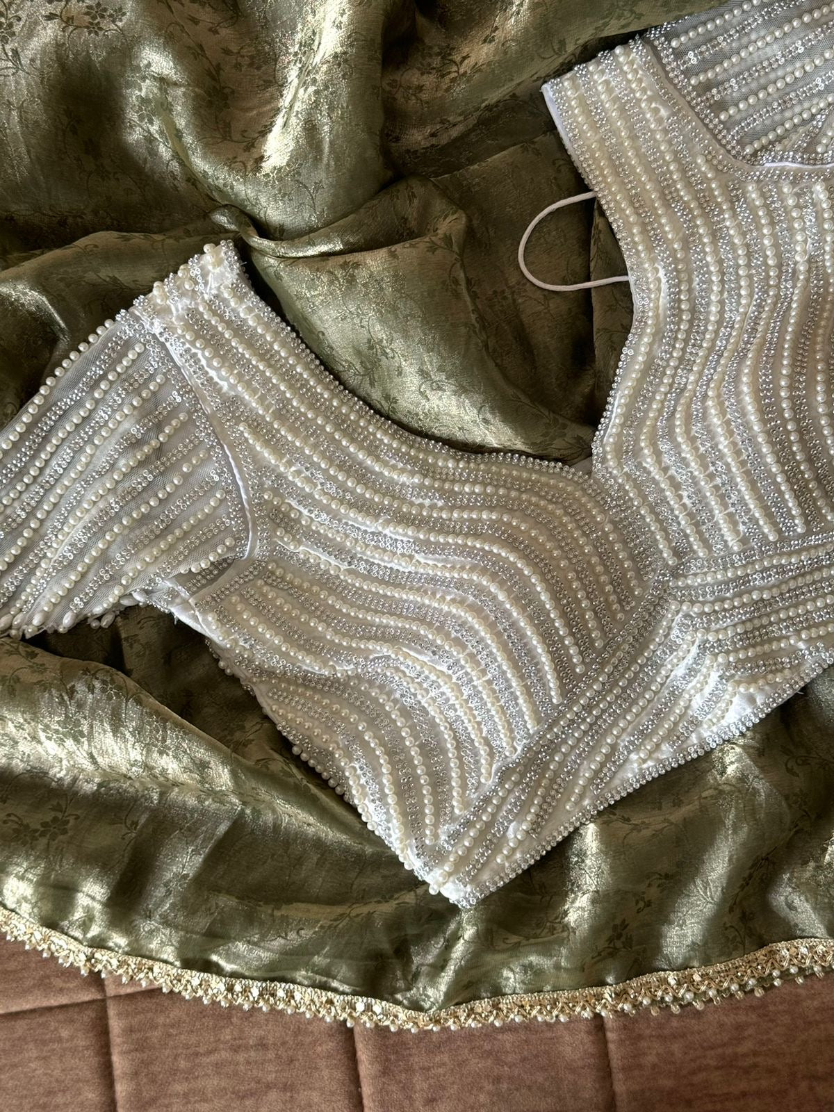 Premium space silk saree with lace and pearl work stitched blouse