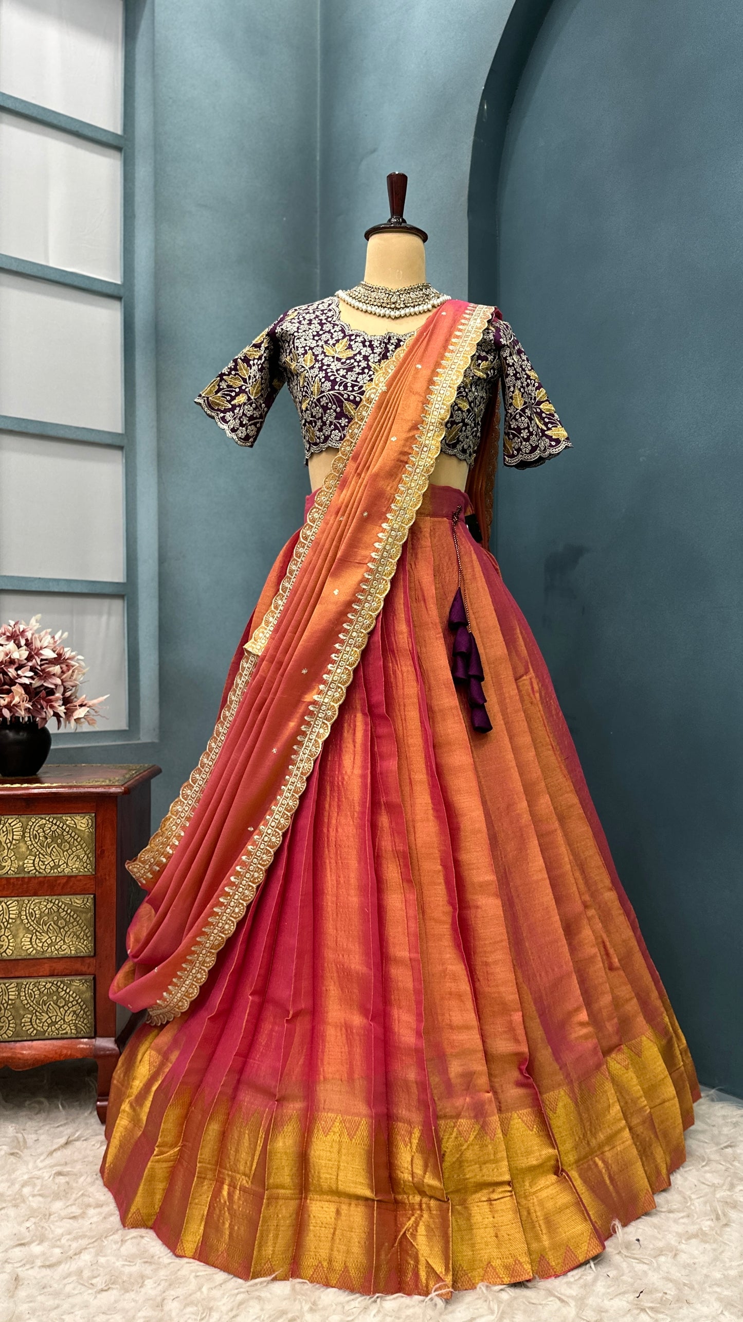 Royal Elegance in Every Pleat 👑
Dual-toned tissue silk lehenga