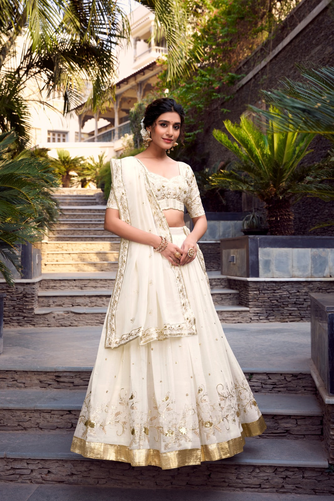 Off-white glam with intricate glossy dance lehenga