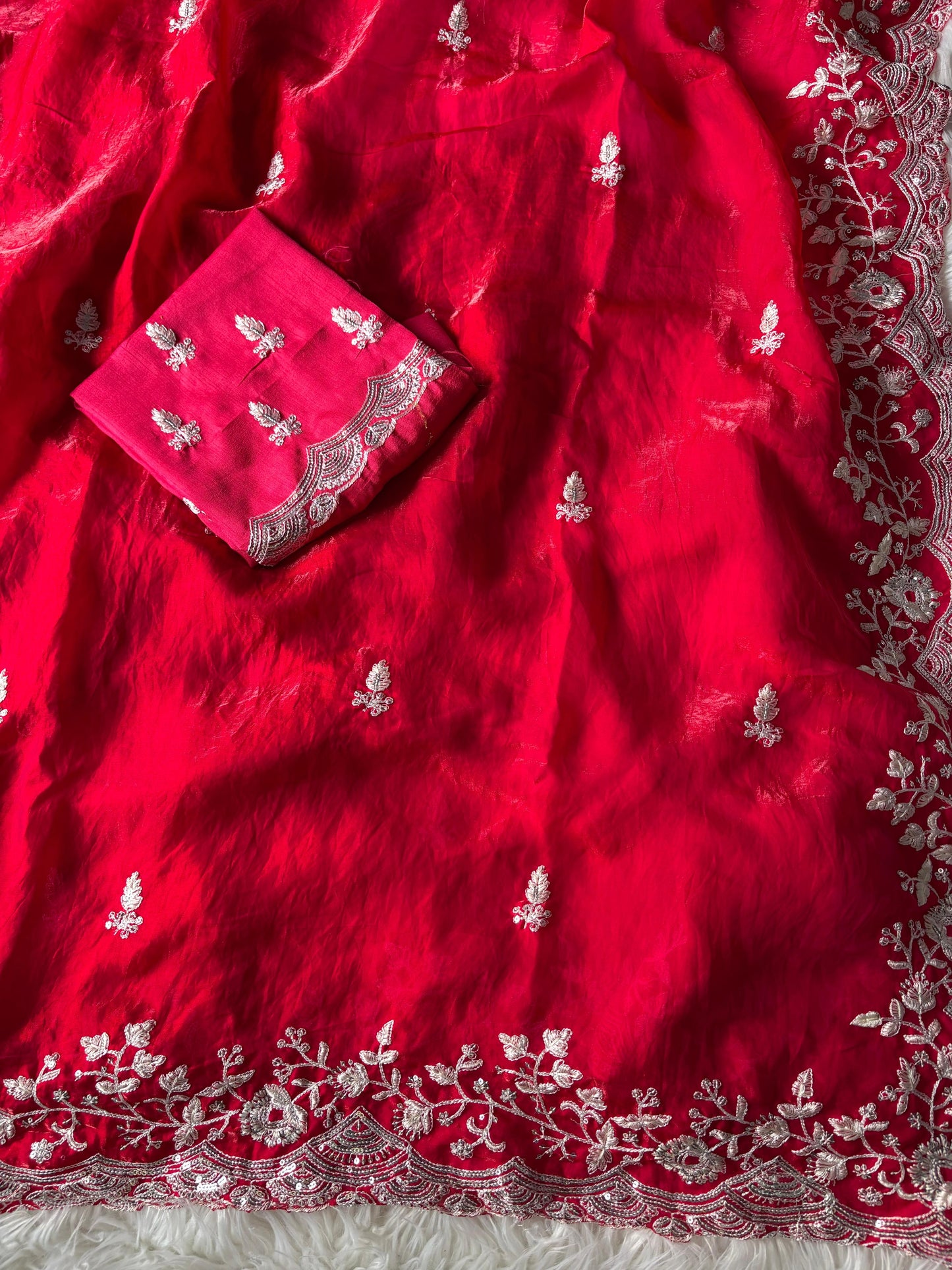 Latest fancy silk saree with an unstitched silk blouse within budget