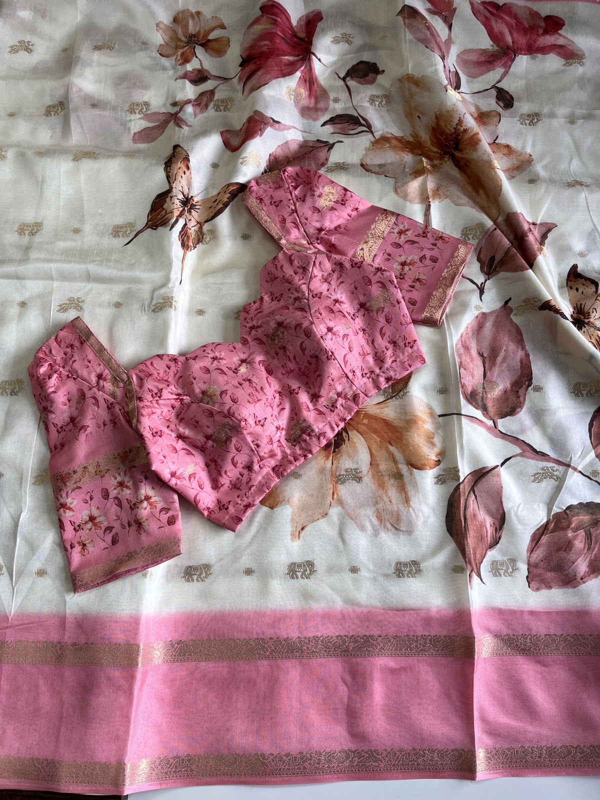 Premium Silk Saree with elegant print on all over the saree with comes stitched Blouse