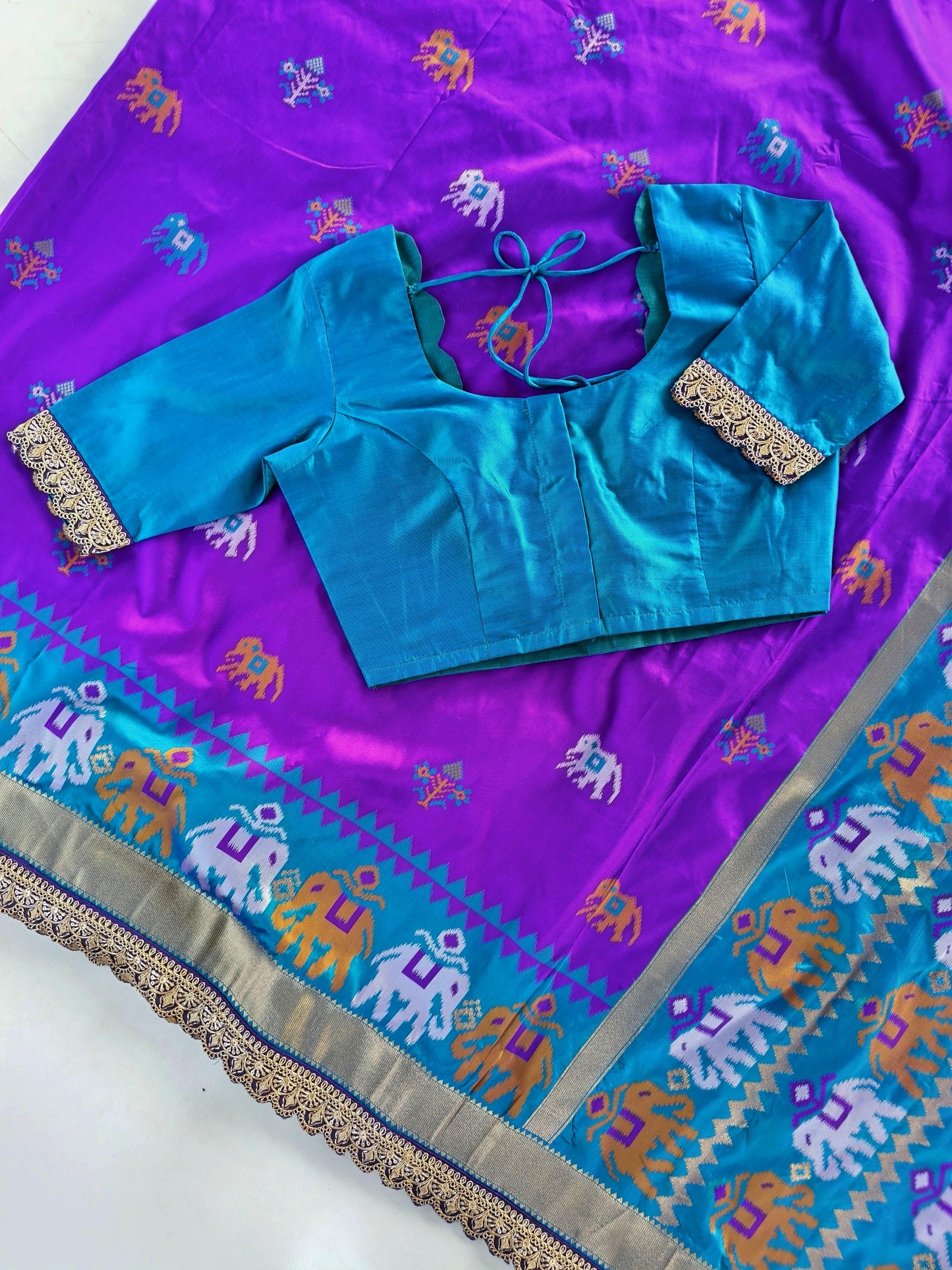 Soft weaves Patola elephant saree with stitched blosue