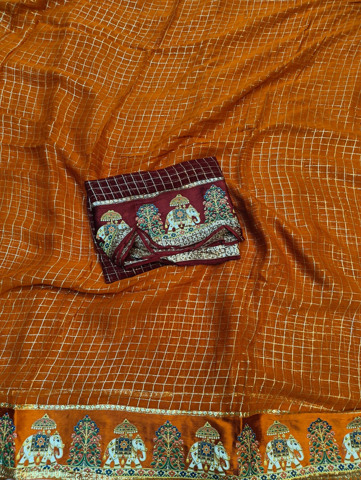 Budget viscose check with satin border golden zari white elephant saree