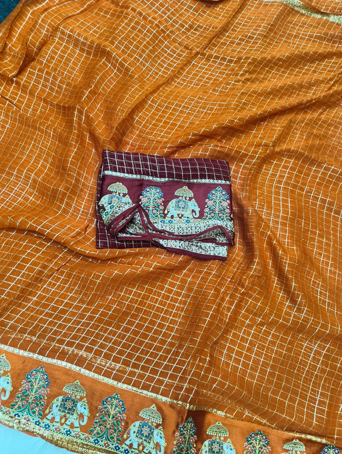 Budget viscose check with satin border golden zari white elephant saree