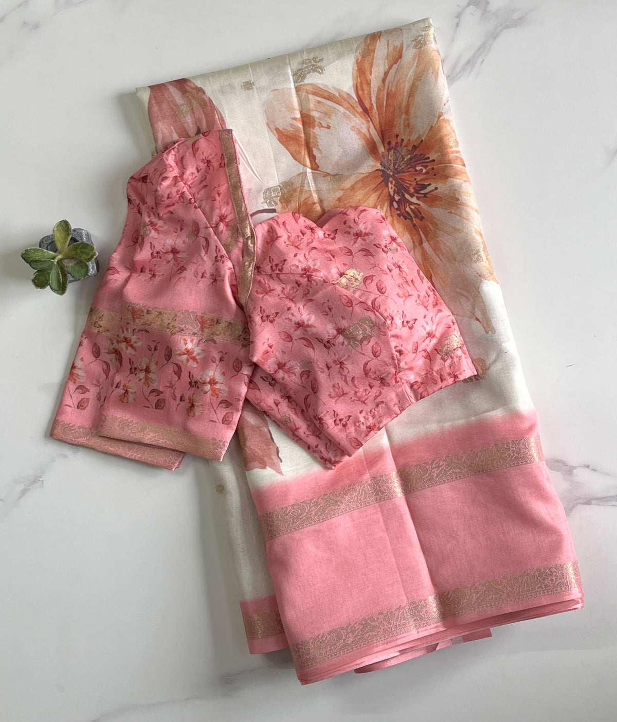 Premium Silk Saree with elegant print on all over the saree with comes stitched Blouse